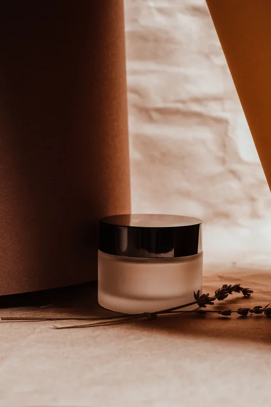 Frosted jar in a fold of kraft paper. Illustrative stock photograph, not the product.